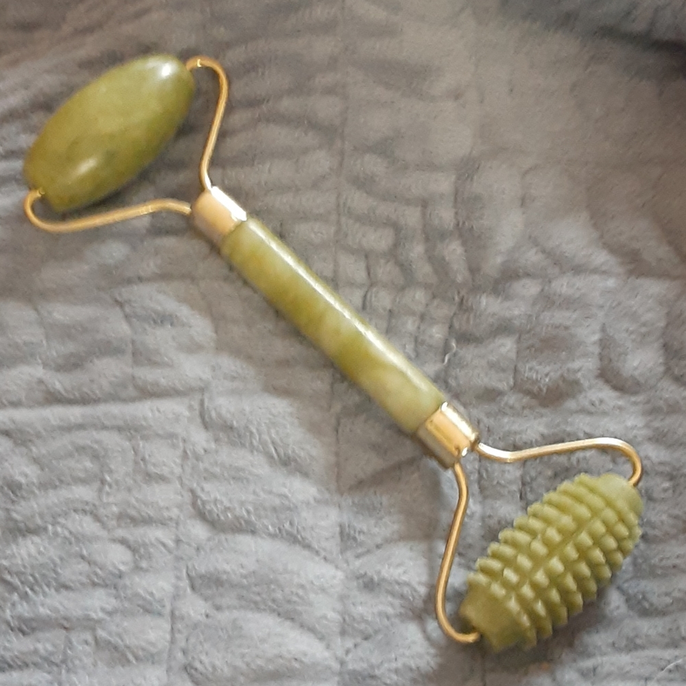 Green jade facial massager